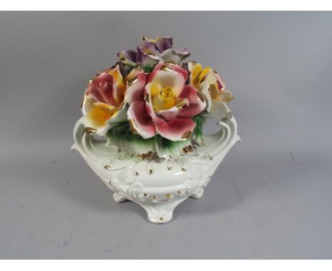 A Large Capo Di Monte Ceramic Floral Ornament.