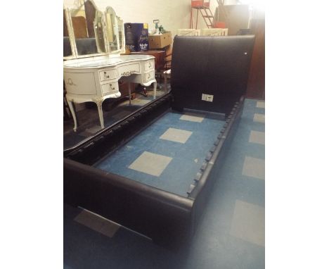 A Leather Effect Upholstered Single Bed.