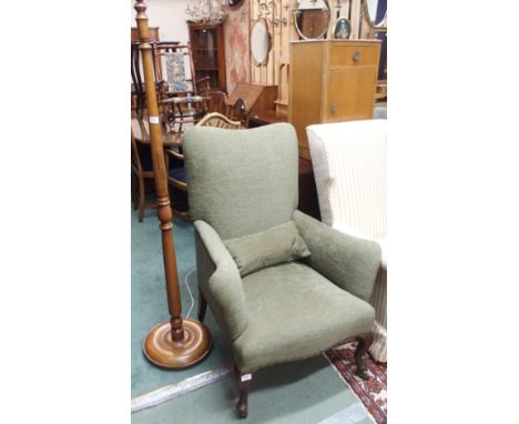 An upholstered armchair and a standard lamp (2) Condition Report: Available upon request