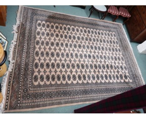 A light ground Bokhara rug, 260cm x 327cm Condition Report: Available upon request