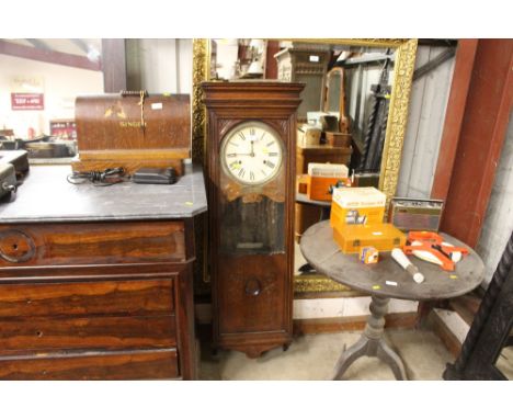 A Bundy oak cased time recorder