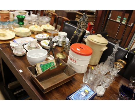 A cake tin of two division; a cutlery tray; a stone ware mould; brass candle stick etc. 