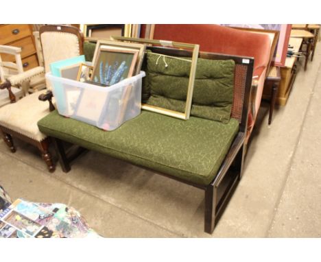 A mahogany and cane back bench 