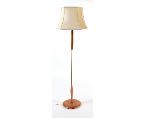 A 20th Century teak and metal lamp standard, with modern shade, 172cms high.