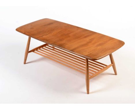 Ercol: a light elm and beech 'Windsor' Model 459 occasional coffee table, 105 x 46 x 36cms high.