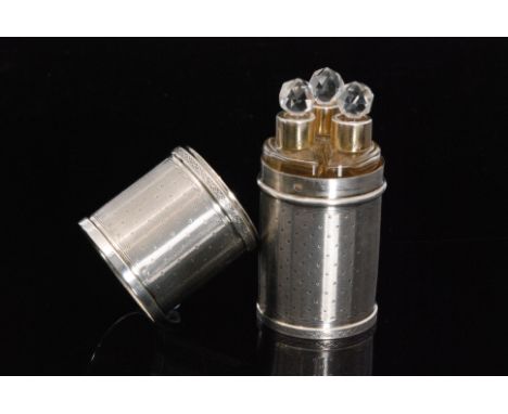 A 19th Century French silver cylindrical scent bottle container with waved engine turned and dot decoration, the slide cover 