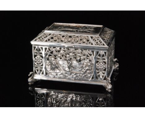 An early 20th Century German hallmarked silver casket of rectangular outline, the hinged cover with embossed panel depicting 