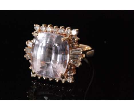 A 14ct kunzite and diamond cluster ring, stepped cushioned shaped central kunzite within brilliant cut diamond surround withi