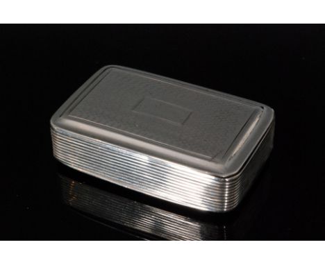 An early Victorian hallmarked silver snuff box of rectangular outline, the hinged lid with engine turned decoration, gilt int