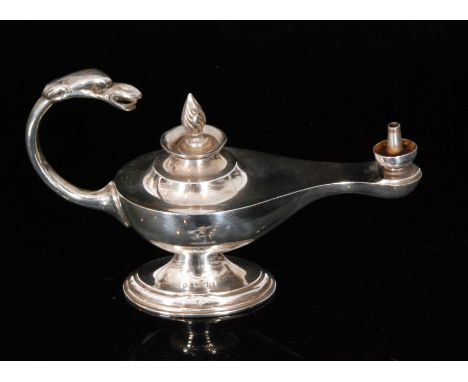 An Edwardian hallmarked silver table lighter modelled as an Aladdin's lamp terminating in griffin mask flying scroll handle, 