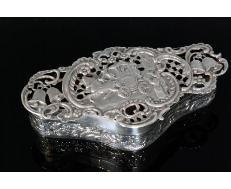 An Edwardian hallmarked silver trinket box of triangular outline the base with embossed scrolling foliate border below hinged