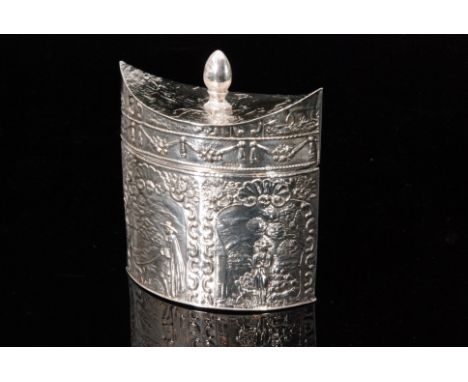 An early 20th Century Dutch silver tea caddy of ovoid oultine embossed with figural vignettes, conforming mitres cap shaped l