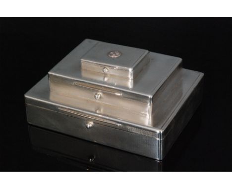 An Art Deco hallmarked silver Asprey and Co gentleman`s triple cigar, cigarette and matchbox case, designed as three stacked 