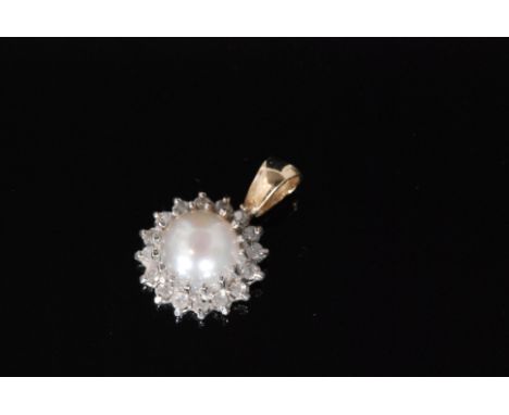 A 9ct cultured pearl and diamond cluster pendant, central pearl within a sixteen claw set diamond surround, diameter of pearl