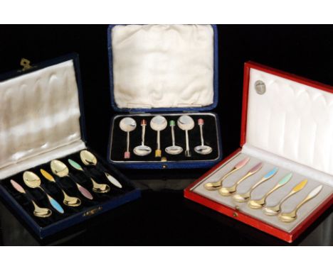 An Art Deco boxed set of six hallmarked silver and guilloche enamel teaspoons, Birmingham 1935 William Hair Haseler and two s