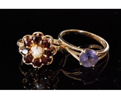 A 9ct garnet and split pearl cluster ring, central pearl within garnet surround, together with a single stone amethyst exampl
