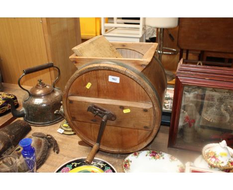 A wooden butter churn