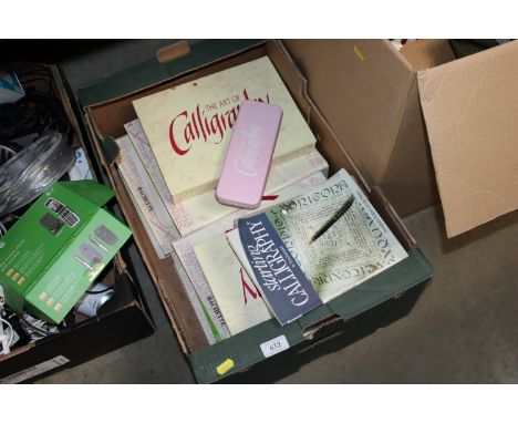 A box containing various  calligraphy items to include inks, pen nibs etc.
