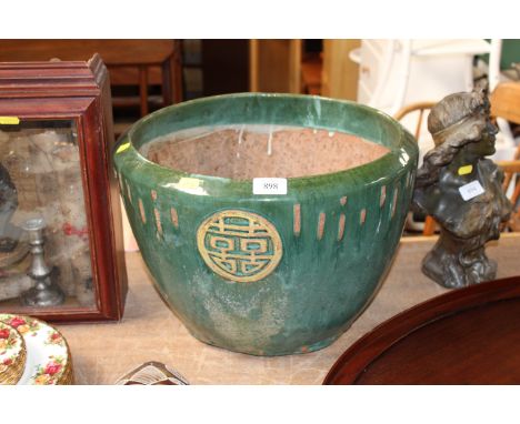 A green glazed Oriental style planter