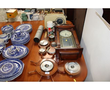 A Bush vintage radio, two wooden cased barometers, a horse shoe and reproduction two hole wall clock