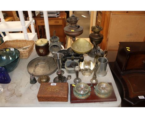 A set of scales and weights; an oak biscuit barrel; two oil lamps; various metal ware