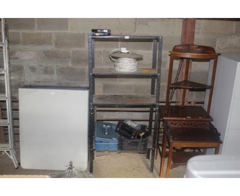 A metal adjustable four tier shelf rack