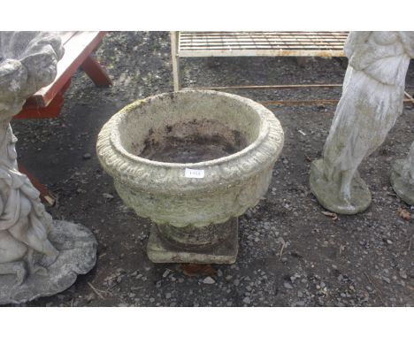 A concrete circular planter