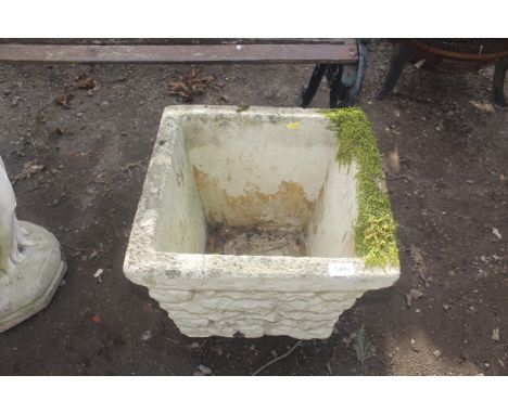 A square concrete garden planter
