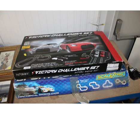 A Scalextric Continental Sports Cars set and a Hobby Victory Challenger set (unknown if complete)