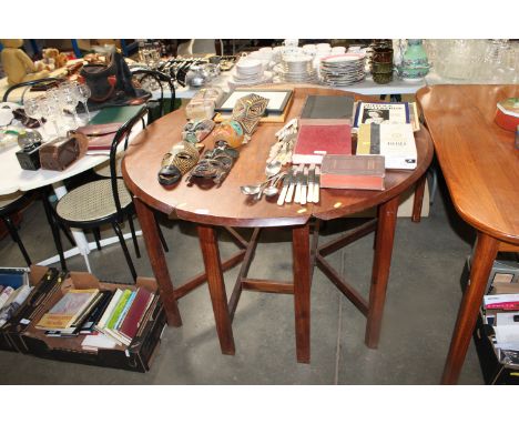 A mahogany gate leg table approx. 47inches diameter and a plywood extending top 