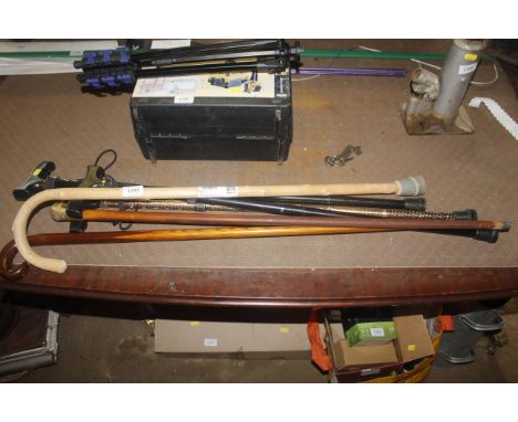 A horn handled walking stick and other various walking sticks
