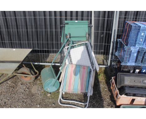 A garden roller, folding garden chairs etc
