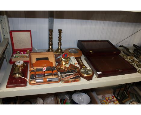 Three display cases and a quantity of various metalware to include brass candlesticks, a cased barometer, Rolls razor etc. 