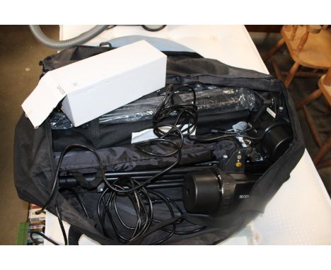 A collection of various studio lighting equipment 