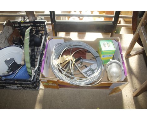 A box containing a reel of wire, metal brackets, vintage outside light fitting etc