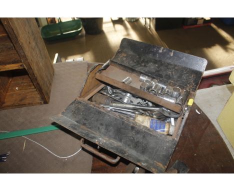 A metal tool box and contents of hand tools
