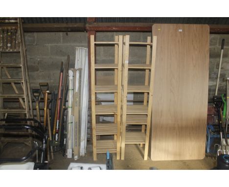 A pair of pine six tier shelf racks
