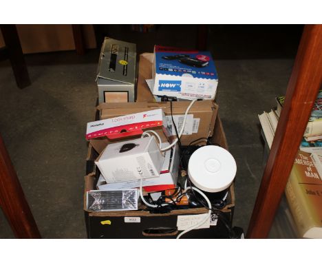 A box containing disco light bulbs, a Now TV box and blank CDs etc