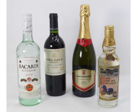 Bacardi Superior rum, 70cl, 37.5%, two bottles; Malibu white rum, one half bottle; Vina Galla Rioja, one bottle; Gran Tradici