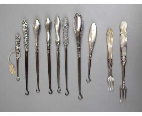 Collection of silver button hooks etc 