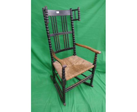 Arts and Crafts bobbin turned rocking chair 