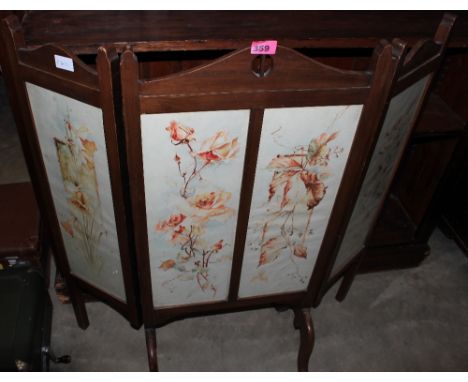 A mahogany triptych firescreen, inset with four glazed panels of painted watercolour flowers. 36" high