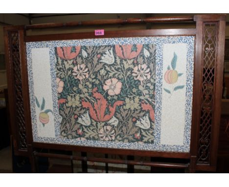 A late Victorian Arts and Crafts mahogany firescreen, fret carved and turned frame. 38" wide