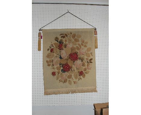 	A 19th Century tapestry hanging on copper pole with braided tassels