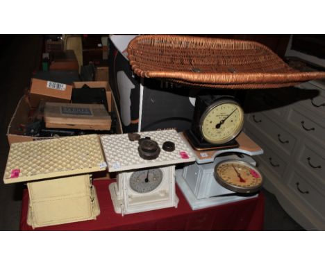 	A Hughes Baby Weigher and three sets of weighing scales