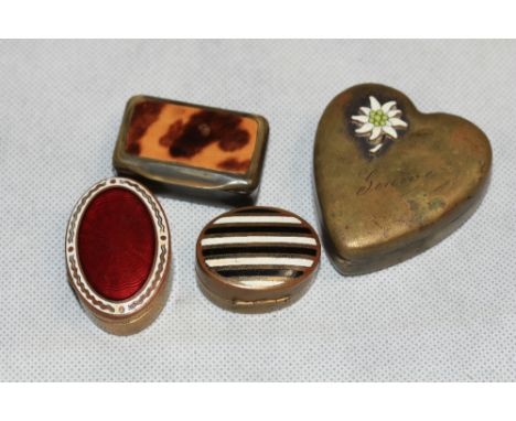 	A pressed horn and tortoiseshell snuffbox, a Swiss heart form brass box and bead contents, a brass enamel pill box and jewel