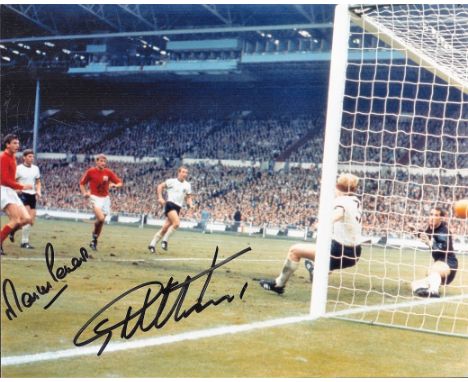 Football. Martin Peters and Geoff Hurst Signed 10x8 colour photo. Photo shows the pair in action Vs Germany. Good Condition. 