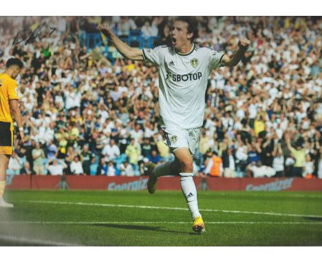 Football Brenden Aaronson signed Leeds United 12x8 colour photo. Brenden Russell Aaronson (born October 22, 2000) is an Ameri