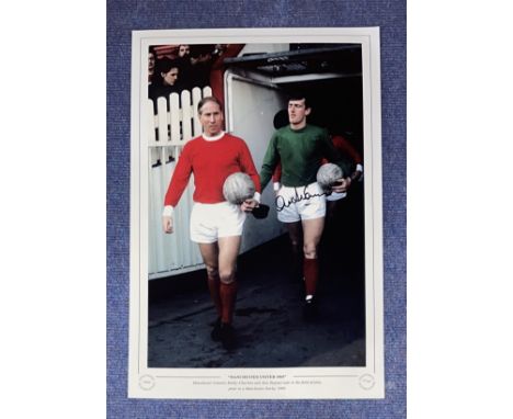 Alex Stepney signed 16x12 Manchester United 1969 colour print. Manchester United's Bobby Charlton and Alex Stepney take to th