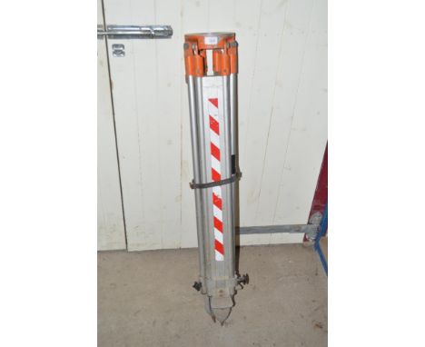 A surveyor's tripod